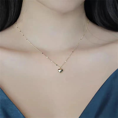 Collar de cadena de clavícula con un corazon