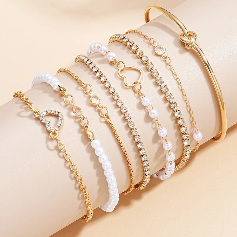8 Pulseras Elegantes Apilables con Forma de Corazón y Pedrería