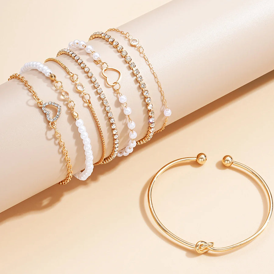 8 Pulseras Elegantes Apilables con Forma de Corazón y Pedrería