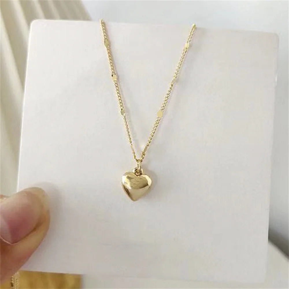 Collar de cadena de clavícula con un corazon