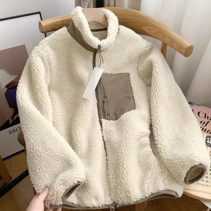Chaqueta borreguito con cremallera y cuello alto