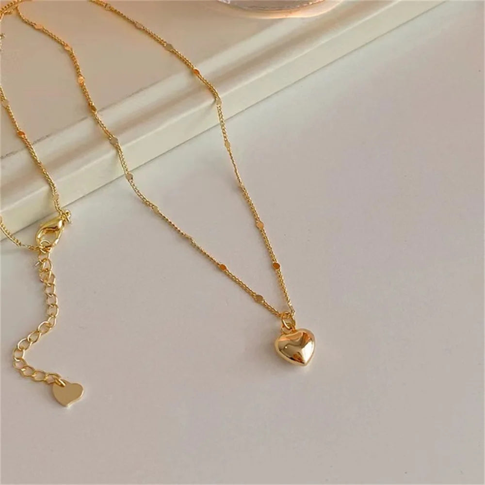 Collar de cadena de clavícula con un corazon